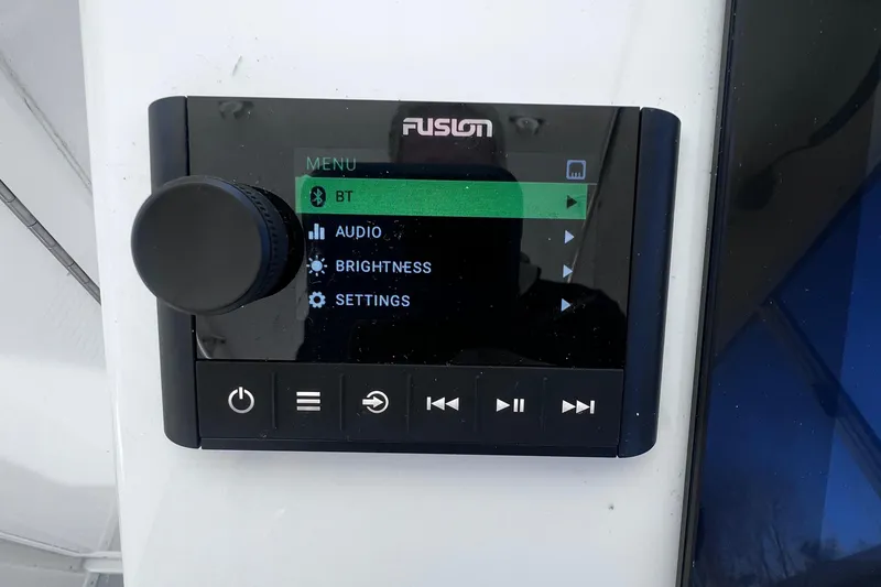 Slide: The Image of Fusion audio control panel on 2022 Steiger Craft 31 Chesapeake boat. - 26