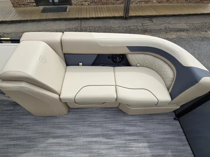 Slide: The Image of Luxurious seating on 2025 Godfrey Sweetwater 2286 QS pontoon boat, featuring elegant beige upholstery. - 15