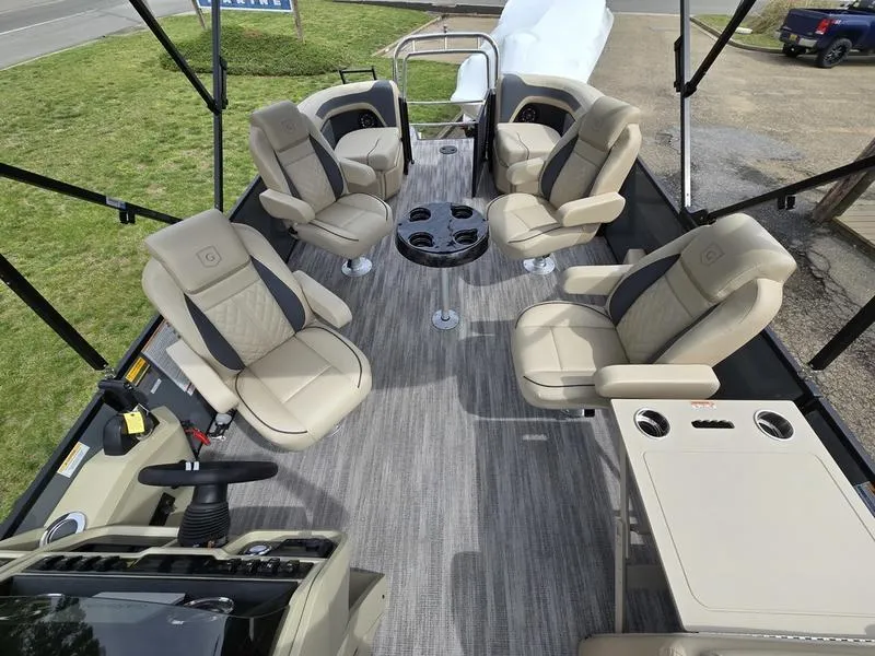 Slide: The Image of 2025 Godfrey Sweetwater 2286 QS pontoon boat interior with plush seating and modern design. - 9