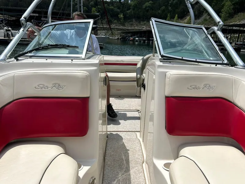 Slide: The Image of 2004 Sea Ray 240 Select boat interior with red and white seating. - 37