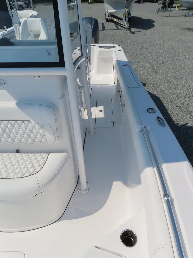 Slide: The Image of 2021 Sportsman Open 282 Center Console boat deck, featuring sleek design and spacious layout. - 22