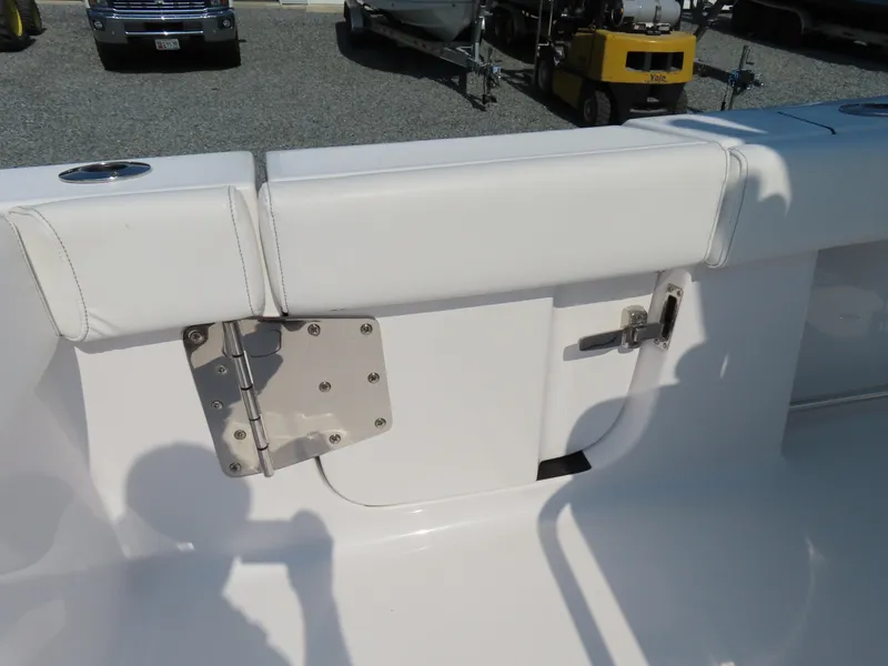 Slide: The Image of 2021 Sportsman Open 282 Center Console boat seating with stainless steel hardware. - 46