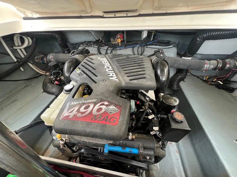 Slide: The Image of Engine compartment of a 2003 Sea Ray 290 Bowrider with MerCruiser 496 MAG engine. - 36