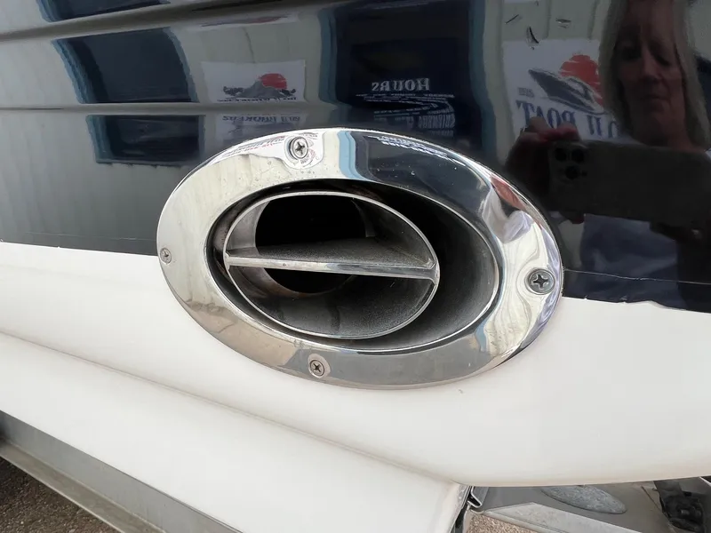 Slide: The Image of Close-up of a 2003 Sea Ray 290 Bowrider boat exhaust vent. - 6