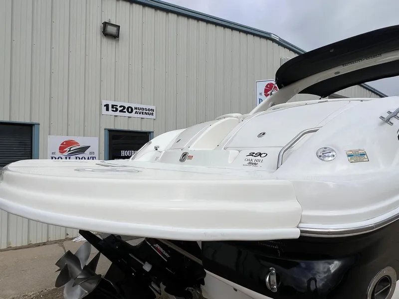 Slide: The Image of 2003 Sea Ray 290 Bowrider boat displayed outside a building at 1520 Hudson Avenue. - 9