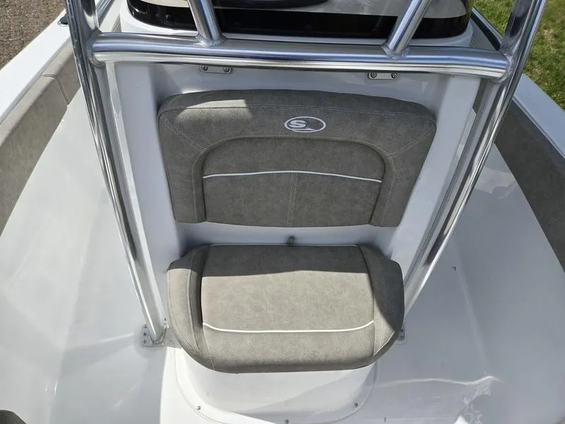 Slide: The Image of 2025 Sea Hunt Ultra 219 boat seat with gray upholstery and sleek design. - 7