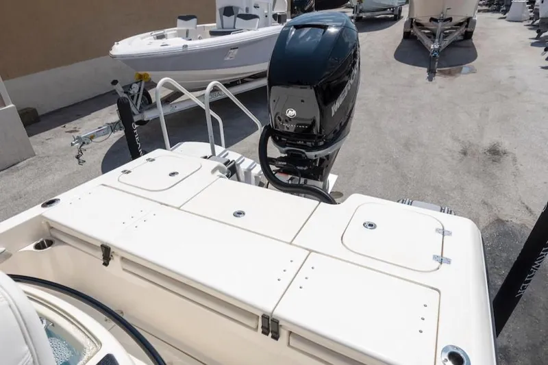 Slide: The Image of 2023 ShearWater 260 Carolina SS boat with powerful outboard motor. - 11