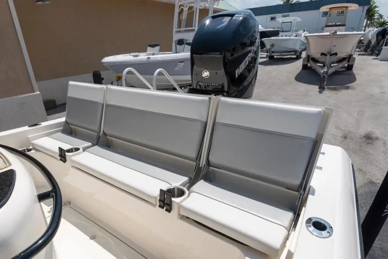 Slide: The Image of 2023 ShearWater 260 Carolina SS boat with comfortable seating and powerful engine. - 12