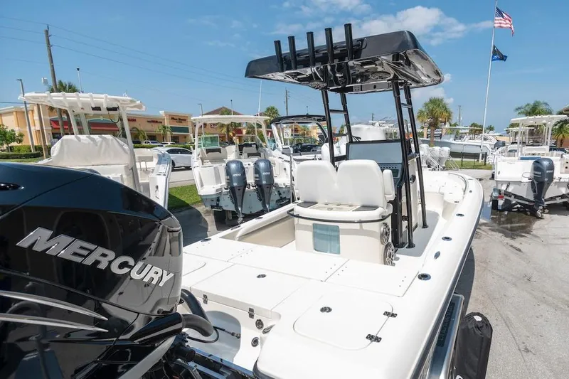 Slide: The Image of 2023 ShearWater 260 Carolina SS boat with Mercury engine, displayed outdoors. - 15