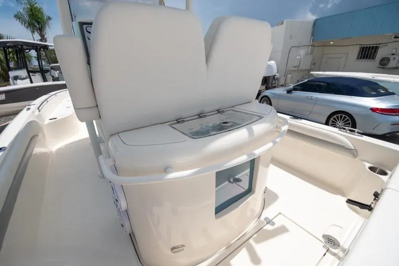 Slide: The Image of 2023 ShearWater 260 SS boat interior with seating and storage. - 11
