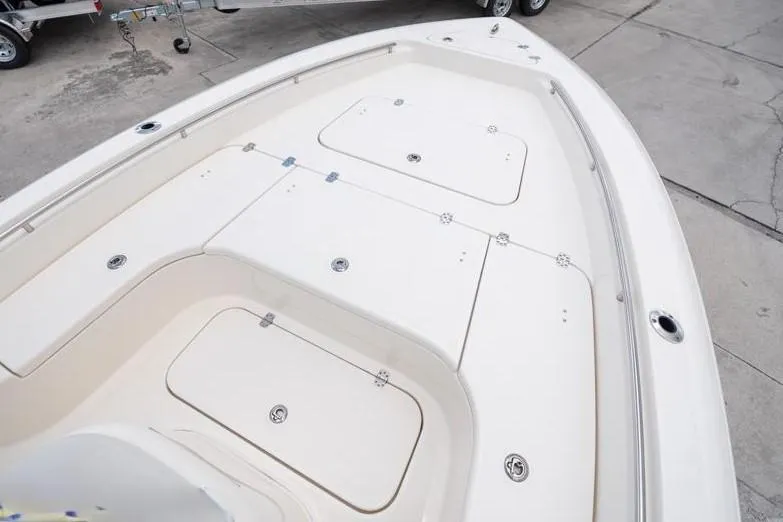 Slide: The Image of 2023 ShearWater 260 SS boat deck with storage compartments, viewed from above. - 15