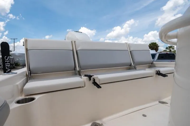 Slide: The Image of 2023 ShearWater 260 SS boat seating under a clear blue sky. - 17