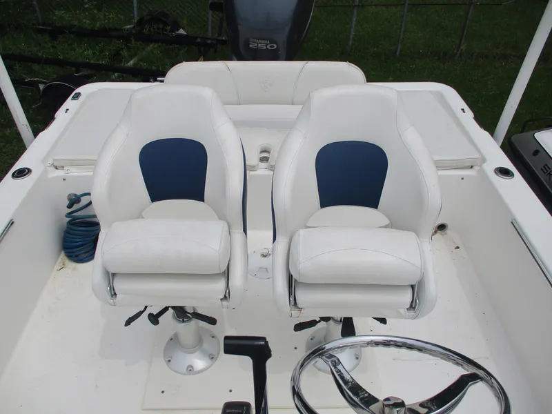 Slide: The Image of Two white and blue boat seats on a 2007 Century 2202 model. - 3