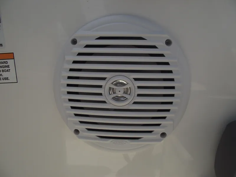 Slide: The Image of White speaker grille on 2025 Bayliner Element E16 boat. - 13