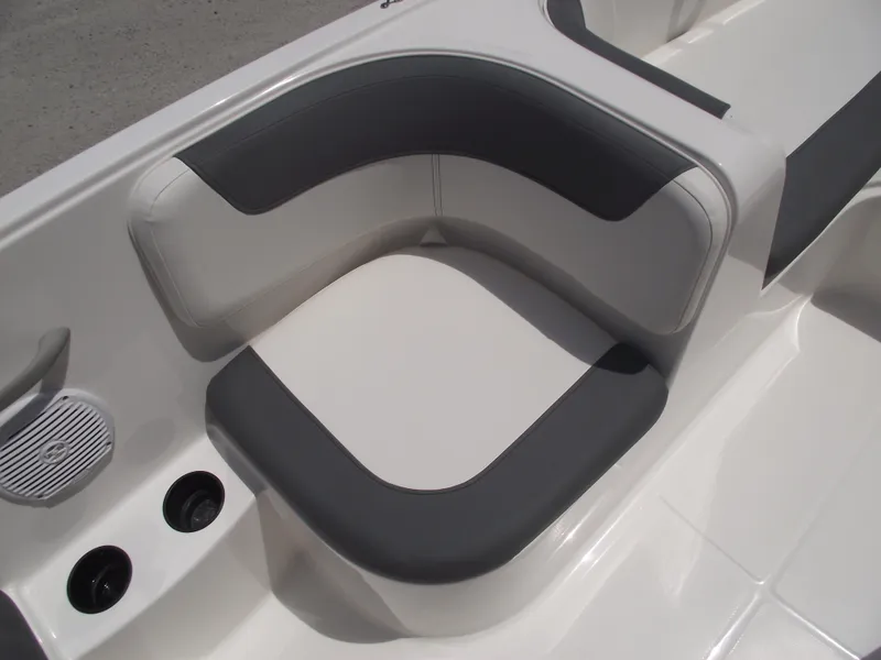 Slide: The Image of 2025 Bayliner Element E16 boat seating with gray and white upholstery. - 21