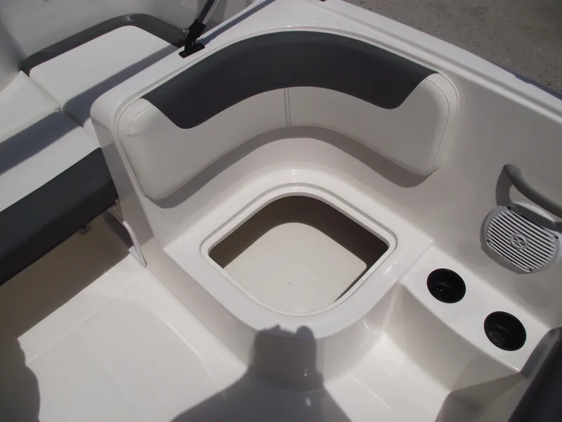 Slide: The Image of 2025 Bayliner Element E16 boat interior with seating and storage compartment. - 24
