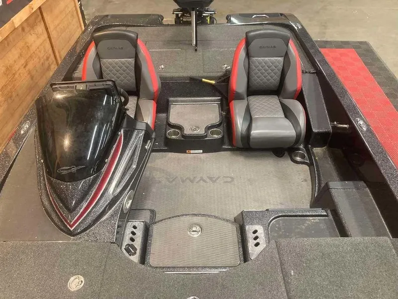 Slide: The Image of 2022 Caymas CX 21 PRO boat interior with dual seats and sleek design. - 11