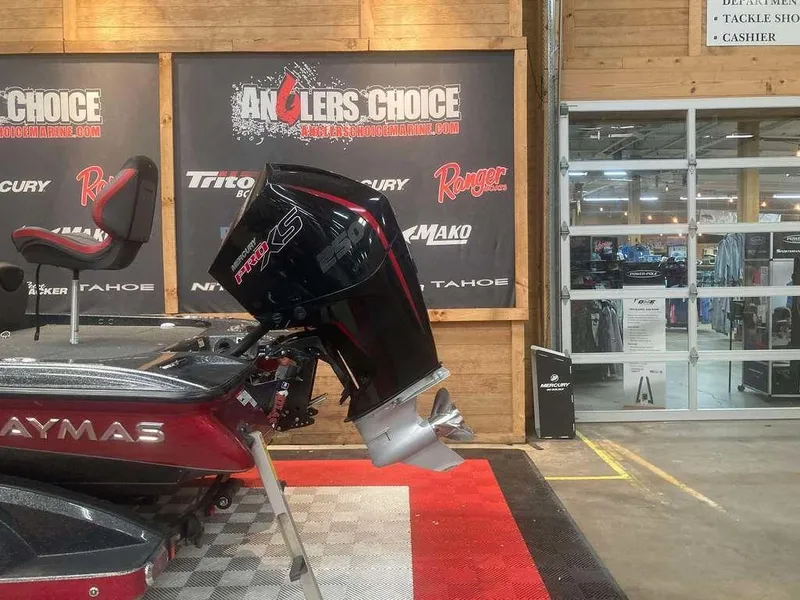 Slide: The Image of 2022 Caymas CX 21 PRO boat displayed at Angler's Choice showroom. - 3