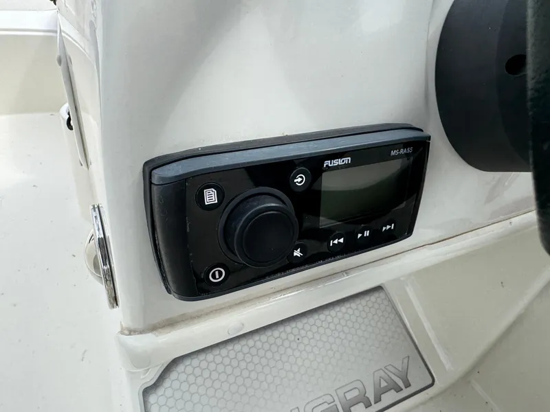 Slide: The Image of Audio control panel on 2019 Stingray 191 DC boat dashboard. - 10