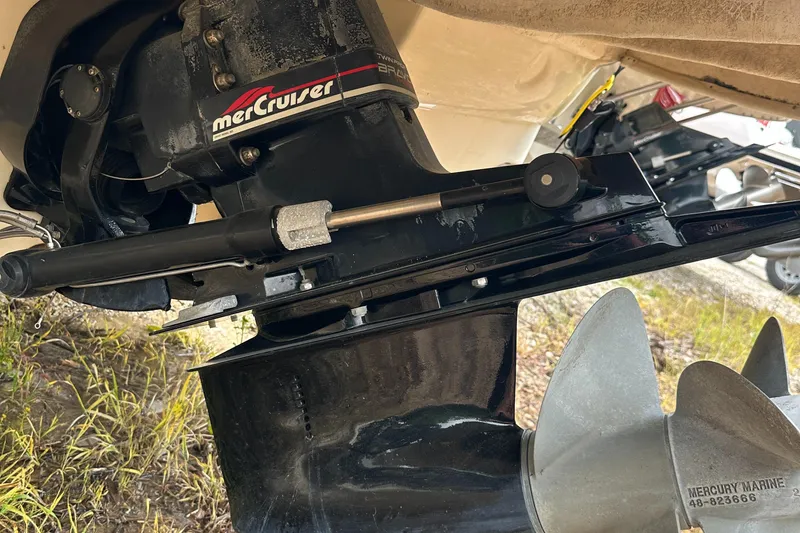 Slide: The Image of MerCruiser engine on 2001 Sea Ray 240 Sundeck, showing propeller and drive components. - 29