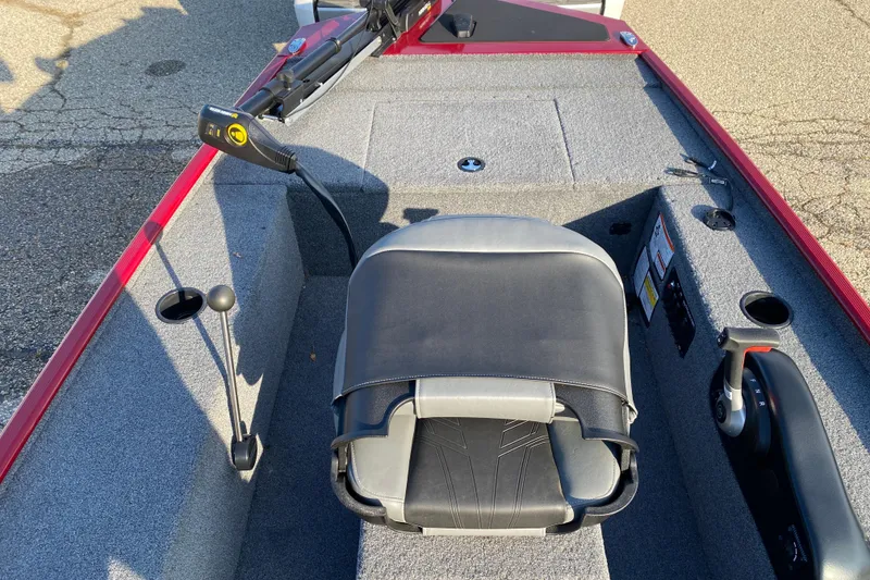 Slide: The Image of 2025 Tracker Panfish 17 boat interior with seat and control panel. - 4