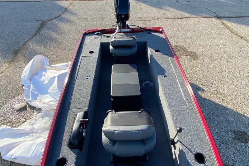 Slide: The Image of 2025 Tracker Panfish 17 boat interior with seating and control panel. - 5