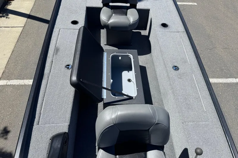 Slide: The Image of 2025 Tracker Panfish 17 boat interior with seating and storage compartments. - 15