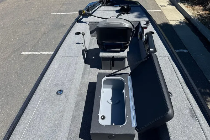 Slide: The Image of 2025 Tracker Panfish 17 boat interior with seating and storage compartments. - 13