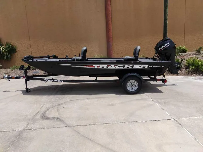 The Image of 2025 Tracker Panfish 17 boat on trailer, side view, outdoors. - 0