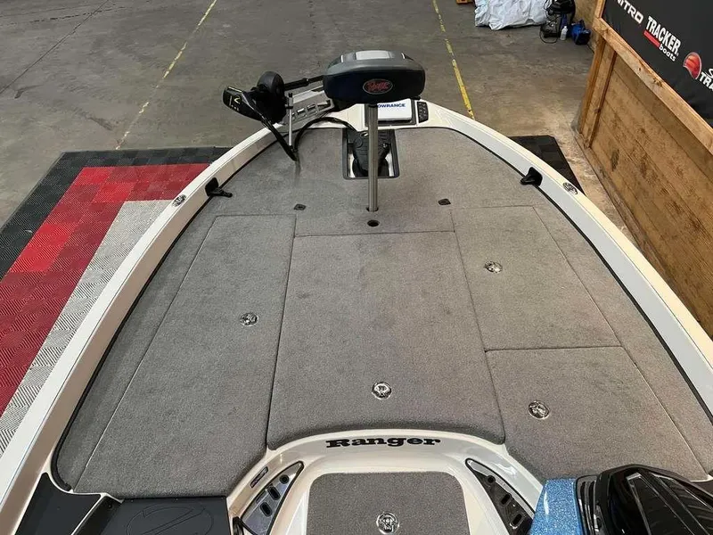 Slide: The Image of 2015 Ranger Z520C boat deck with carpeted surface and mounted equipment. - 7