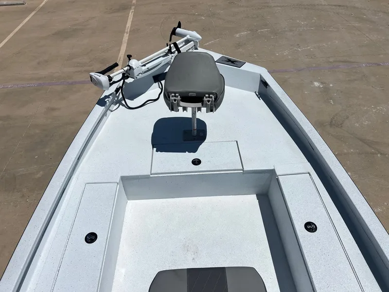Slide: The Image of 2025 Xpress SW20B boat deck with seat and trolling motor. - 48