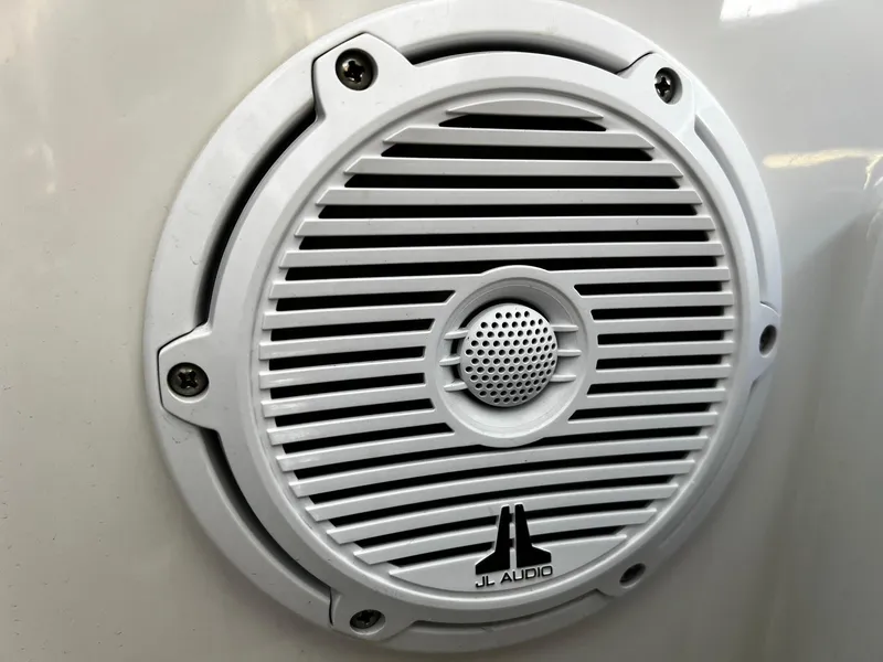 Slide: The Image of White JL Audio speaker on a 2013 Protector Targa 30 boat. - 30