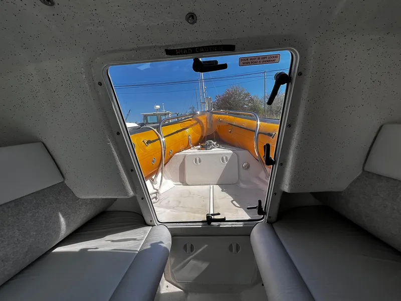 Slide: The Image of Interior view of 2013 Protector Targa 30 boat, showing cabin and hatch. - 35