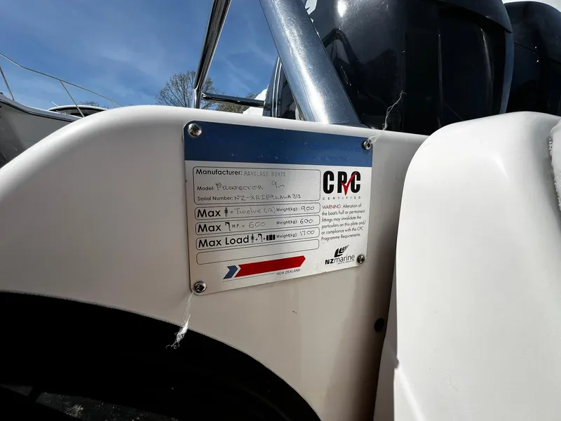 Slide: The Image of Plaque on 2013 Protector Targa 30 boat, displaying specifications and load capacity. - 41