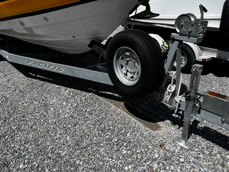 Slide: The Image of Trailer for 2013 Protector Targa 30 boat on gravel surface. - 42