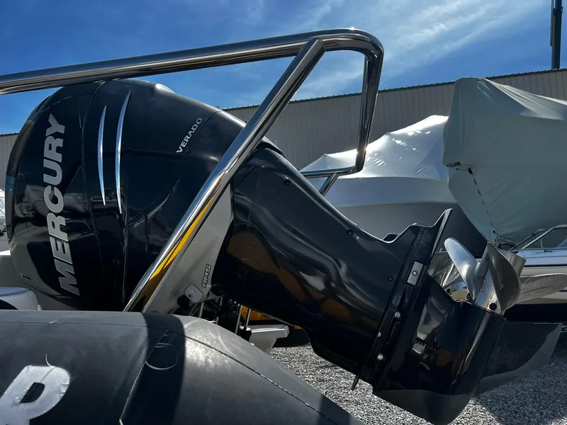 Slide: The Image of Outboard motor on a 2013 Protector Targa 30 boat, featuring a Mercury Verado engine. - 9