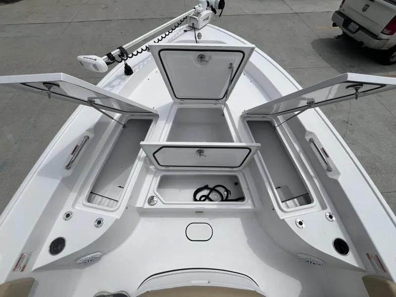 Slide: The Image of 2023 Sportsman Masters 267 boat with open storage compartments on deck. - 8