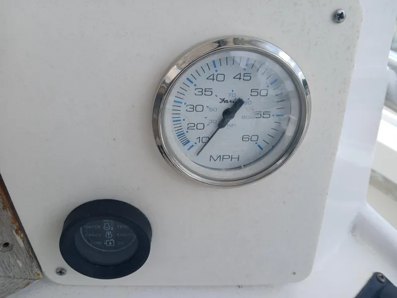 Slide: The Image of Speedometer of a 1980 Mako 213 boat, displaying speed in MPH. - 8