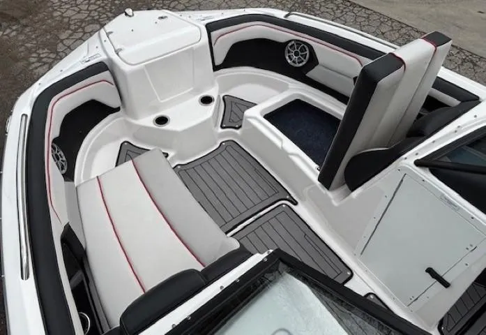 Slide: The Image of 2018 Yamaha Boats 212X interior with sleek seating and modern design. - 10