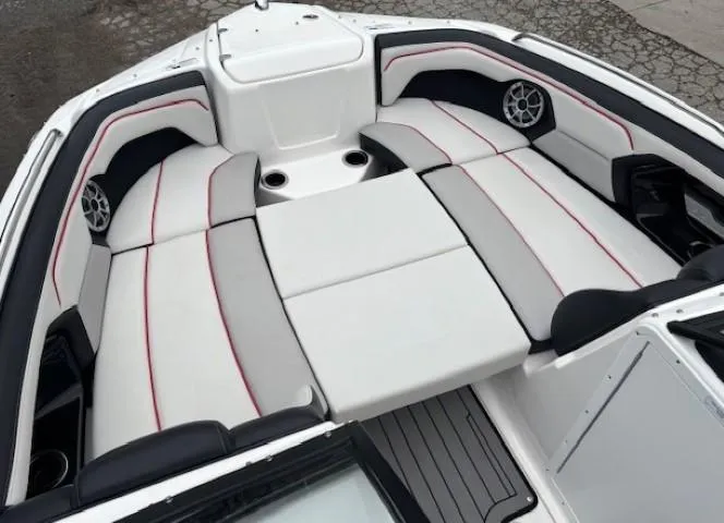 Slide: The Image of 2018 Yamaha Boats 212X interior with spacious seating and modern design. - 12