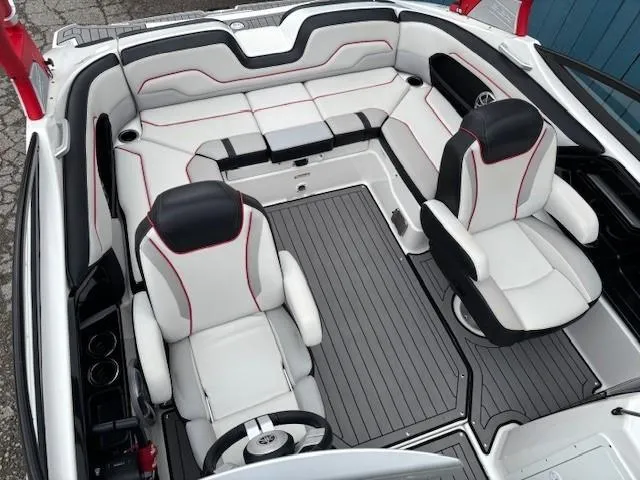 Slide: The Image of 2018 Yamaha Boats 212X interior with sleek seating and modern design. - 28