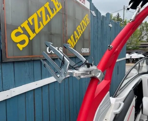 Slide: The Image of 2018 Yamaha Boats 212X with red wakeboard tower at Sizzle Marine dealership. - 39