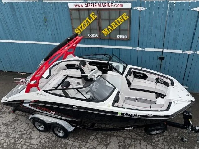 Slide: The Image of 2018 Yamaha Boats 212X on trailer, displayed at Sizzle Marine, Ohio. - 7