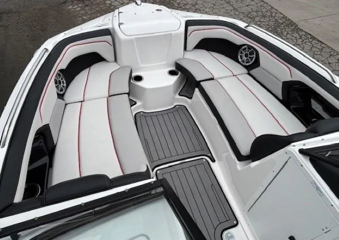 Slide: The Image of 2018 Yamaha Boats 212X interior with sleek seating and modern design. - 9