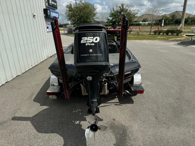 Slide: The Image of Rear view of a 2013 Blazer 625 boat with a 250 Pro motor. - 20