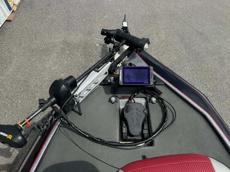 Slide: The Image of Bow of a 2013 Blazer 625 boat with trolling motor and fishfinder. - 6