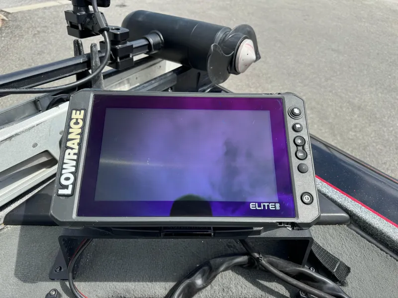 Slide: The Image of Lowrance Elite fish finder on a 2013 Blazer 625 boat dashboard. - 7