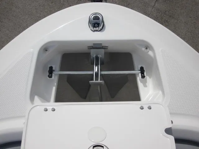 Slide: The Image of 2025 Chaparral 21 SSi boat anchor compartment, featuring a sleek, modern design. - 13