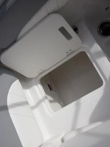 Slide: The Image of Storage compartment in 2025 Chaparral 21 SSi boat interior. - 18