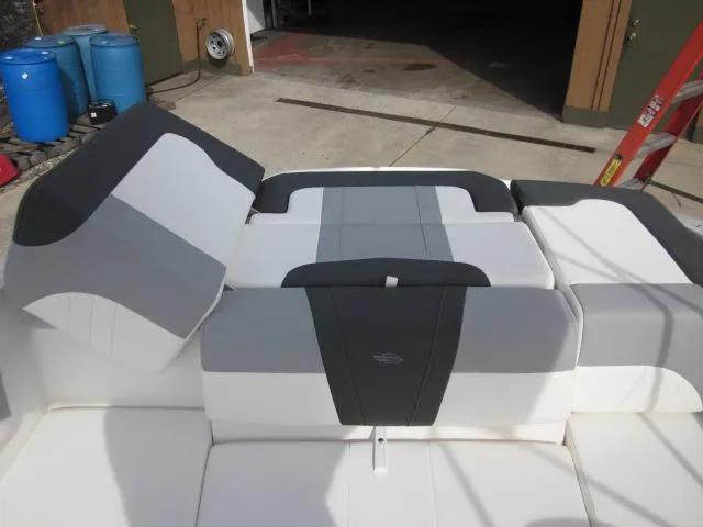 Slide: The Image of 2025 Chaparral 21 SSi boat interior with gray and white seating. - 20
